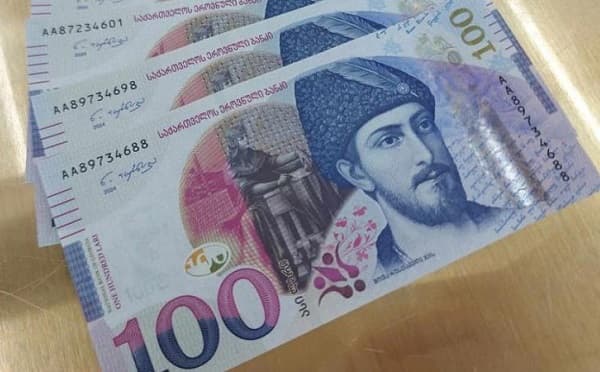 ეროვნული ბანკის შენობა და ვალუტის კურსის გრაფიკული გამოსახულება