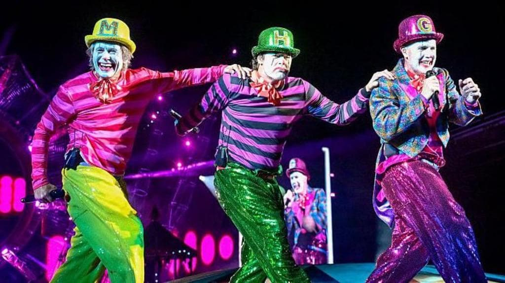 Take That-ის წევრები კონცერტის დროს სცენაზე